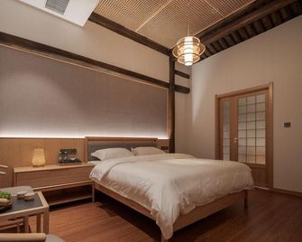 Zhi Zhi Home · Bamboo Art Homestay - Taizhou - Bedroom