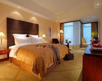 New Century Grand Hotel Zhuji Yaojiang - Shaoxing - Camera da letto