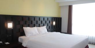 Grand Orchid Hotel Yogyakarta - Depok - Bedroom