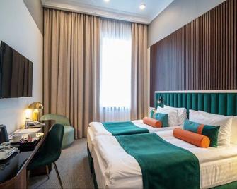 Oktiabrskaya - سانت بيترسبورغ - غرفة نوم