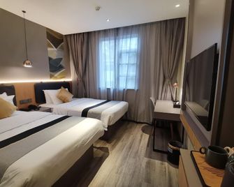 Home Inn Selected Xiamen University Nanputuo Temple - Xiamen - Habitación