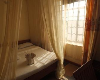 Afrika Lodges - Voi - Спальня