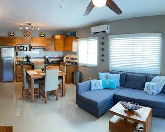 New beach side condo just steps from 3 beautiful beaches - Río San Juan - Living room