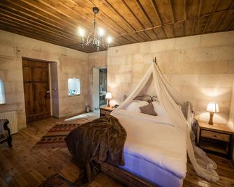 Duven Hotel Cappadocia - Uchisar - Kamar Tidur