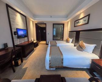 Henan Hairong Hotel - Zhengzhou - Bedroom