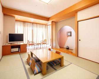Japanesestyle room 10 tatami mats with bath and toilet 2 meals included Very popular Miyazaki / Nichinan Miyazaki - Nichinan - Eetruimte