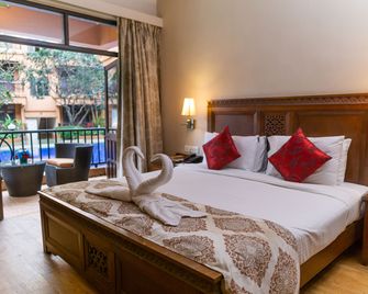 Neelam's The Grand Hotel Goa - קלנגוטה - חדר שינה