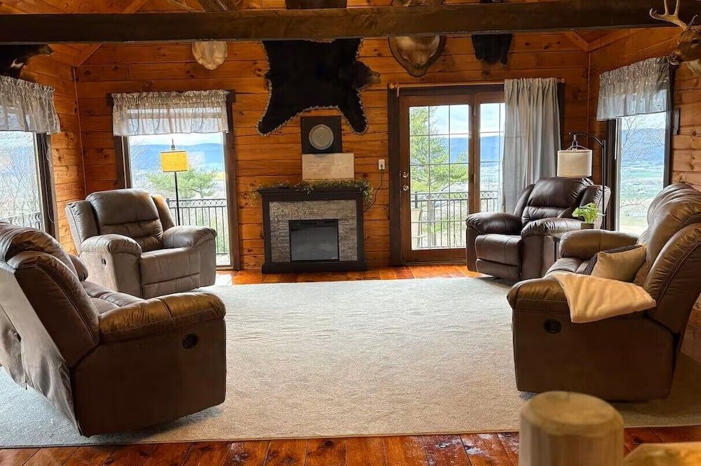 Enjoy a beautiful log cabin overlooking Belleville, PA with stunning views