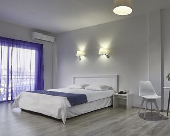 Mikes Kanarium City Hotel - Lárnaca - Habitación