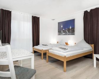 Pension Genat - Wedemark - Schlafzimmer