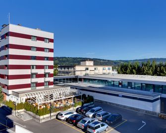 Hôtel Rallye & Entrées aux Bains de la Gruyère - Bulle FR - Gebäude