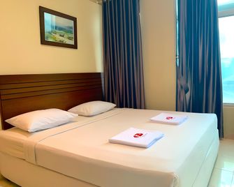 Hotel Parma Pekanbaru - Pekanbaru - Habitación