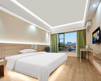 Heyi Business Hostel - Shenzhen - Kamar Tidur