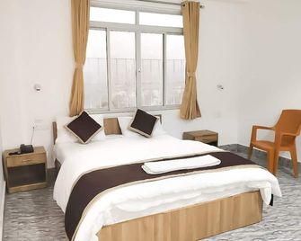 Hotel East Inn - Gangtok - Slaapkamer