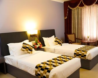 Hotel Gopalapuram International - Pollachi - Habitación