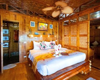The Coral Blue Oriental Beach Villas and Suites - Santa Fe - Slaapkamer
