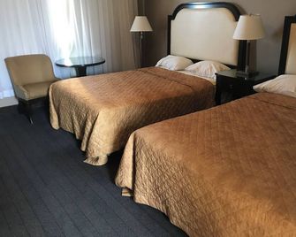 Rainbow Motor Inn - Fallsview - ניאגרה פולס - חדר שינה