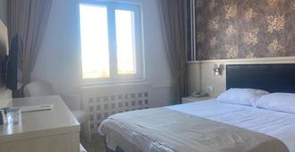 Sim-er Hotel - Kars - Bedroom