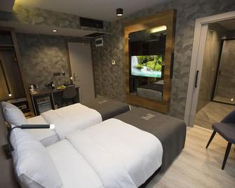 Emens Hotel - Izmir - Bedroom