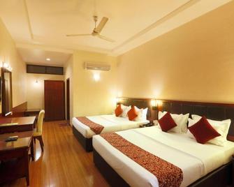 Hotel Millennium - Guwahati - Bedroom