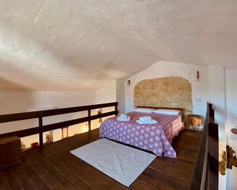 Tenuta Blancamar Country Bed & Breakfast - Sant'Antioco - Schlafzimmer