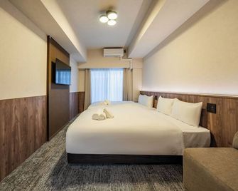 Apartment Hotel 11 Nippombashi - Osaka - Habitación