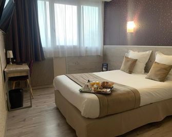 Contact Hôtel Foch - בזאנסו - חדר שינה