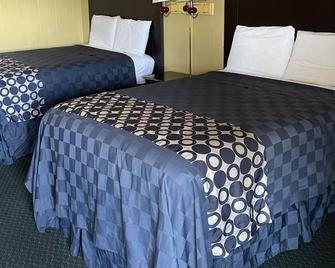 Budget Inn - Monroeville - Schlafzimmer