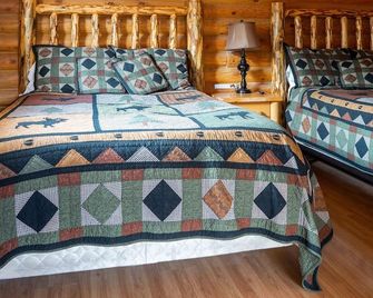 Country Cabins Inn - Lyman - Bedroom