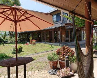 Yufuin Flora House - Yufu - Binnenhof