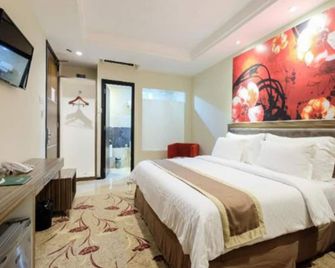 Travellers Hotel Phinisi - מקאסר - חדר שינה