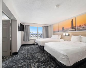 Days Inn & Suites by Wyndham Norton Shores/Muskegon - Muskegon Heights - Bedroom