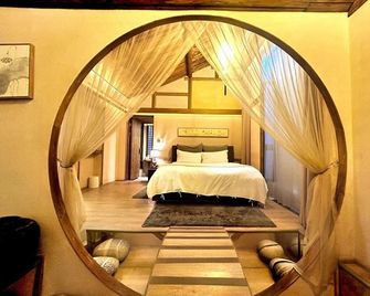 Yueshang Zen Space Homestay (Tongli Ancient Town Branch) - Suzhou - Bedroom