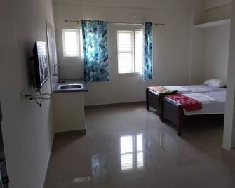 Saukarya Guesthouse - Kolar - Bedroom