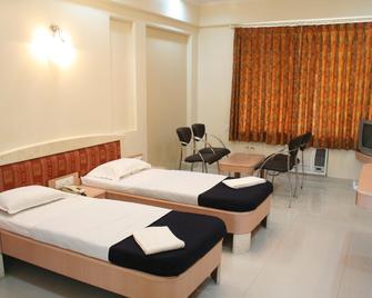 Hotel Sai International - Urun Islāmpur - Habitación