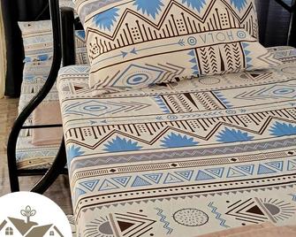 مالونجاي أبارتمنتس - ماريفيليس - غرفة نوم