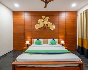 Treebo Premium The Memoir, Ramdaspeth - Nagpur - Schlafzimmer