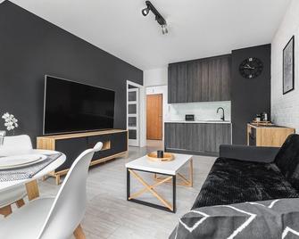 Apartamenty Solny Brzeg by Renters Prestige - Kolobrzeg - Sala de estar