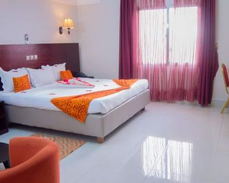 Hôtel La Rose Blanche Abidjan - Abidżan - Sypialnia