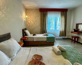 Ergül Motel - Küçükkuyu - Schlafzimmer