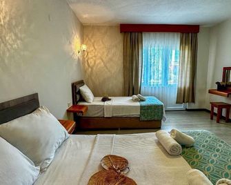 Ergül Motel - Küçükkuyu - Bedroom