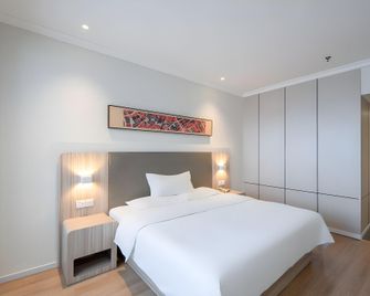 Hanting Hotel Zigong Lantern Park - Zigong - Bedroom
