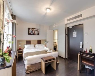 فندق سورس - باريس - غرفة نوم