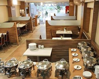 Hotel Landmaark Tiruppur - Tiruppur - Restaurace