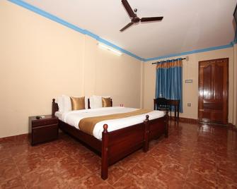 OYO 6711 Geojo Residency - Nedumbassery - Schlafzimmer