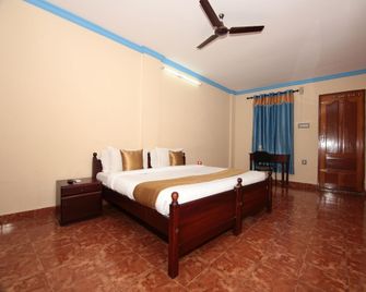 OYO Geojo Residency - Nedumbassery - Bedroom
