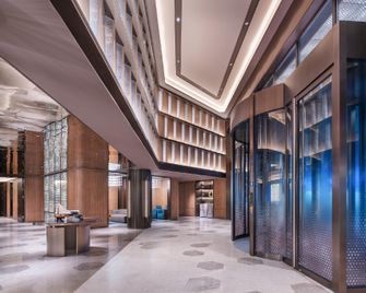 Crystal Orange Qingdao Taidong Pedestrian Street Yan'an Third Road Hotel - تشينغداو - ردهة