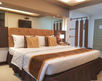 North Tourist Inn - Bacolod - Bedroom