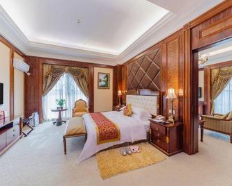 Jiangmen Gladden Hotel - Jiang Men - Спальня