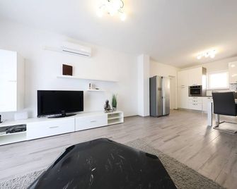 Carmen Apartment Deluxe - Vir - Huiskamer